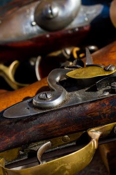 Antique muzzleloaders on display.