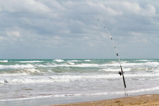 Fishing on the beach of South Padre Island, TX.