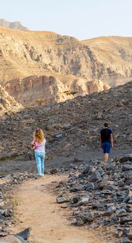 Kids hiking in the mountains.
