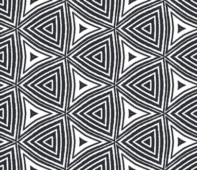 Geometric seamless pattern. Black symmetrical kaleidoscope background. Textile ready exquisite print, swimwear fabric, wallpaper, wrapping. Hand drawn geometric seamless design.
