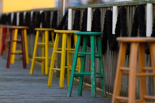 Multucolor stools at the Pier 19 on South Padre Island, TX.