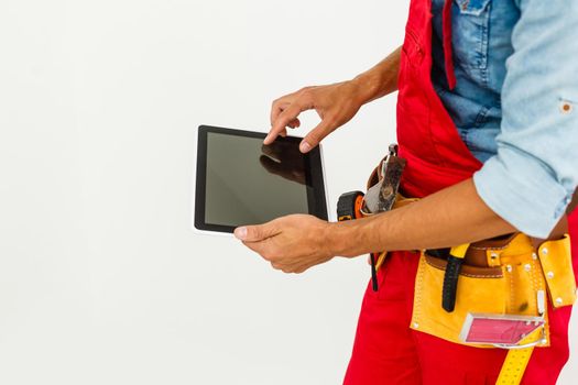 Construction Worker with a tablet. Planning Developer Concept.