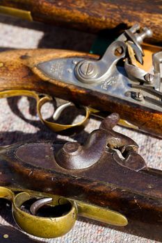 Antique muzzleloaders on display.