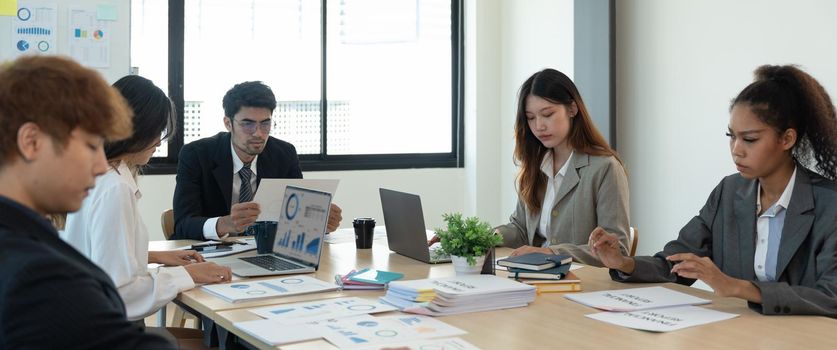 Diverse businesspeople meeting discussion for financial a meeting around an office