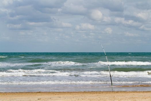 Fishing on the beach of South Padre Island, TX.