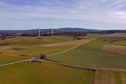 Rural landscape with two wind turbines taken from the air