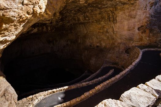 Switchback footpath winds into natural opening of Carlsbad Caverns.