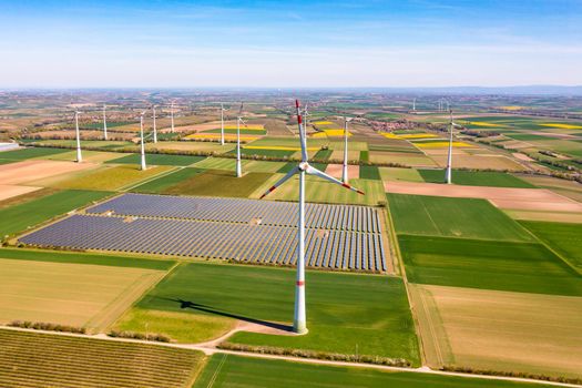 Renewable energies produced by wind turbines and solar parks on the fields in Rhineland-Palatinate