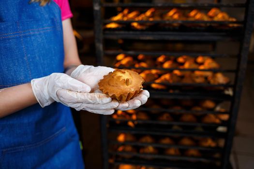 Girl preparing cookies, in a small bakery, family business, authentic, hobby, mood, comfortable. Caring and love