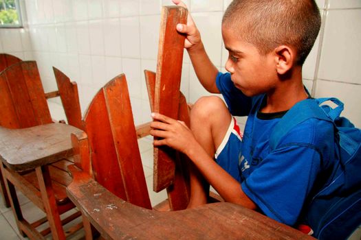 eunapolis, bahia / brazil - march 10, 2009: Broken classroom furniture is seen at the Municipal School in Eunapolis City.