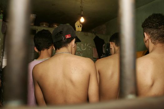 teixeira de freitas, bahia, brazil - august 4, 2009: juvenile offenders are seen in a cell in the prison complex in the city of Teira de Freitas.