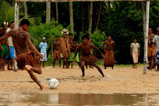 santa cruz cabralia, bahia / brazil - april 20, 2009: indians of the Pataxo ethnicity are seen during a soccer match at indigenous games in the Coroa Vermelha village in the city of Santa Cruz Cabralia.