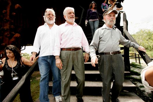 nova vicosa, bahia / brazil -  September 3, 2009: Jaques Wagener, Governor of Bahia is seen by Frans Krajcberg, artist and environmental activist at La Sitio Natura in Nova Vicosa.