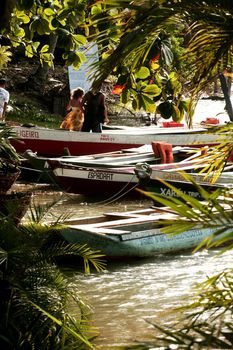 porto seguro, bahia, brazil - december 30, 2009: Canoes used to cross the Caraiva River in the countryside of the city of Porto Seguro.

