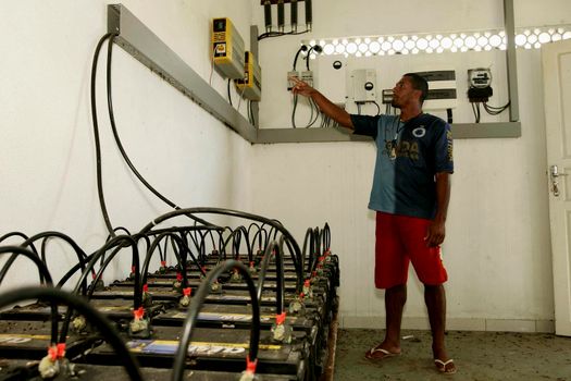 nova vicosa, bahia / brazil - february 15, 2009: battery for the conservation of electricity are seen in a power generation project in the community of Cassumba Island, in Nova Vicosa.