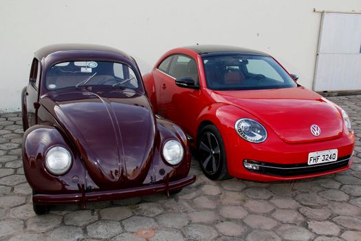 salvador, bahia / brazil - may 8, 2013: Volkswagen beetle opened in 1948 alongside the 2013 New Beetle model, seen in the city of Salvador.

