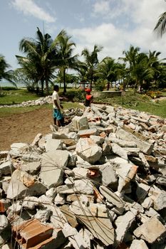 porto seguro, bahia / brazil - october 21, 2009: the rest of the demolished material of a construction is seen in a beach area in the city of Porto Seguro, in the south of Bahia.