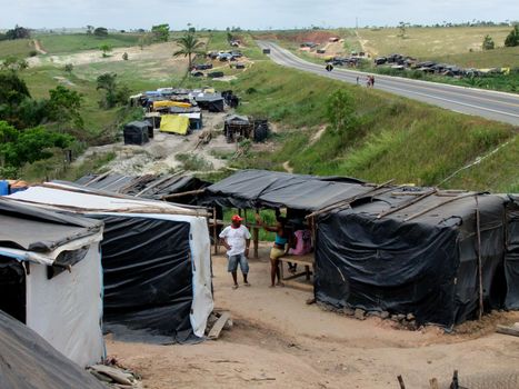 eunapolis, bahia / brazil - october 22, 2009: Camp of the Landless Movement - MST - is seen on the banks of the BR 101 highway in the city of Eunapolis.