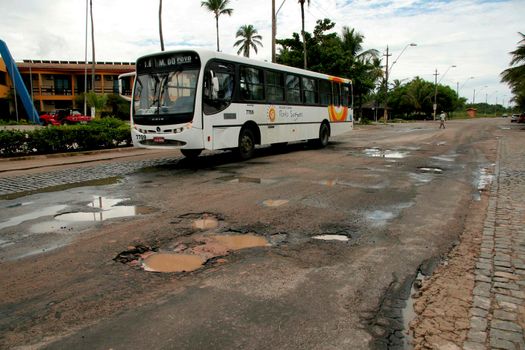 eunapolis, bahia / brazil - may 5, 2009: holes are seen in the asphalt of federal highway BR 367 in the municipality of Eunapolis.