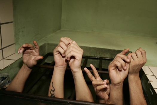 teixeira de freitas, bahia, brazil - august 4, 2009: juvenile offenders are seen in a cell in the prison complex in the city of Teira de Freitas.