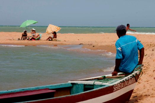 Porto Seguro, Bahia / Brazil - December 30, 2009: People are seen on Caraiva Beach, south coast of Porto Seguro city.