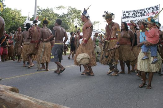 porto seguro, bahia, brazil - august 6, 2009: Indigenous people of ethnic Pataxo are seen during a protest on the BR 367 highway in the city of Porto Seguro.