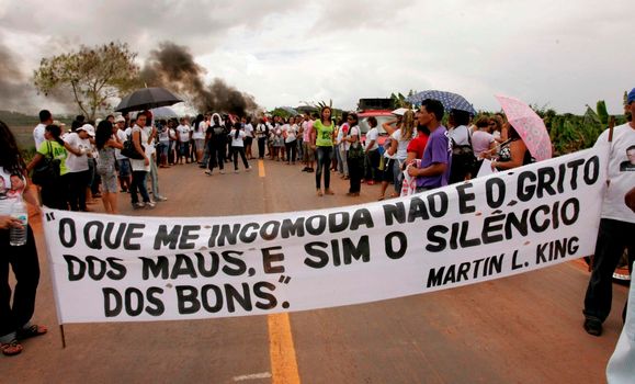 eunapolis, bahia / brazil  - october 15, 2009: Teachers close BR 101 highway to protest the death of colleagues in ambush in Porto Seguro city.