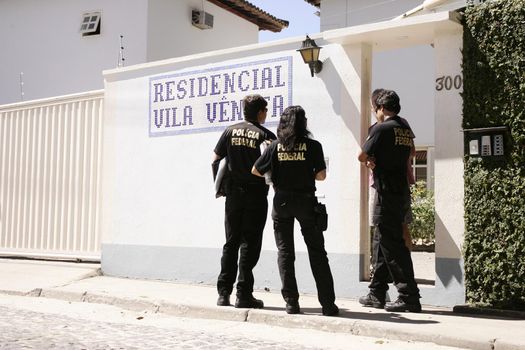 porto seguro, bahia, brazil - august 6, 2009: Federal Police agent during a police operation in the city of Porto Seguro.