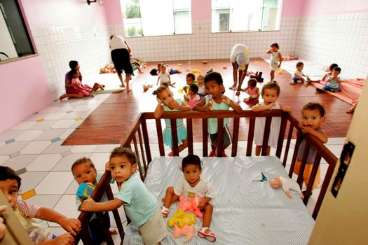 eunapolis, bahia / brazil - october 8, 2009: children are seen in a nursery maintained by a NGO in the city of Eunapolis.