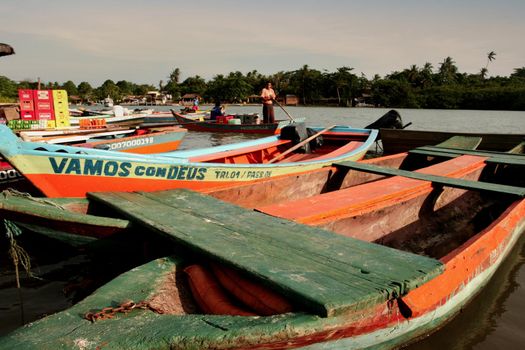 porto seguro, bahia, brazil - december 30, 2009: Canoes used to cross the Caraiva River in the countryside of the city of Porto Seguro.

