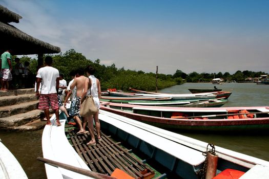 porto seguro, bahia, brazil - december 30, 2009: Canoes used to cross the Caraiva River in the countryside of the city of Porto Seguro.

