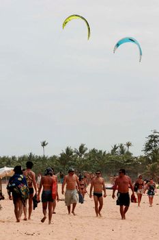 porto peguro, bahia / brazil - december 30, 2009: People are seen on Caraiva beach in Porto Seguro.


