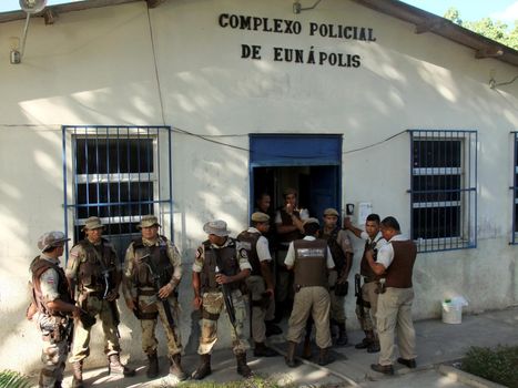 eunapolis, bahia, brazil - january 1, 2010: Police officers control prisoners during a riot at a police station in the city of Eunapolis.