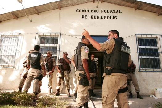 eunapolis, bahia, brazil - january 1, 2010: Police officers control prisoners during a riot at a police station in the city of Eunapolis.