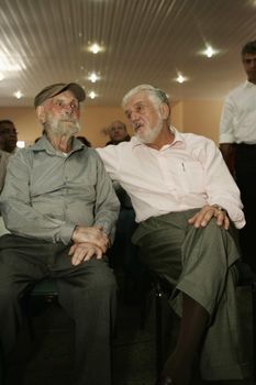 nova vicosa, bahia / brazil - september 3, 2009: Jaques Wagener, Governor of Bahia is seen by Frans Krajcberg, artist and environmental activist at La Sitio Natura in Nova Vicosa.