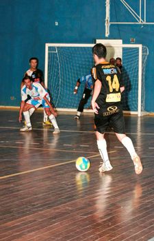 eunapolis, bahia / brazil - naovember 21, 2009: athletes are seen during a futsal match on a sports court in the city of Eunapolis.