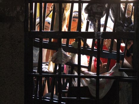 eunapolis, bahia, brazil - january 1, 2010: Prisoners are seen in a cell during a riot in a prison in the city of Eunapolis.