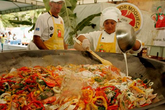 belmonte, bahia / brazil - july 19, 2009: chief cook prepares a giant fish stew in the city of Belmonte, in the south of Bahia.