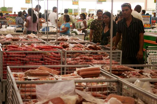 eunapolis, bahia, brazil - august 10, 2009: Customers seen shopping at a supermarket in the city of Eunapolis in southern Bahia.