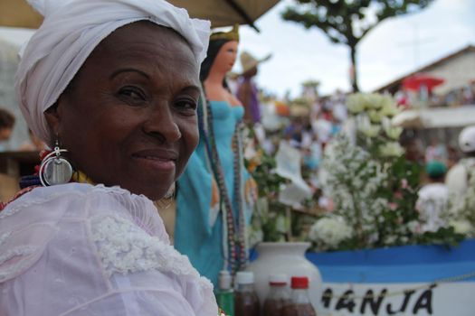 salvador, bahia, brazil - february 2, 2015: Candomble devotees and supporters of the African matriaz religion pay tribute to the orixa Yemanja in the city of Salvador.