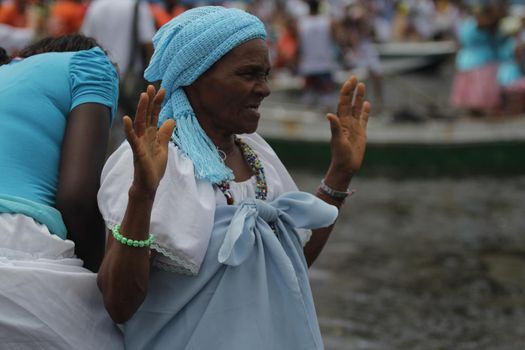 salvador, bahia, brazil - february 2, 2015: Candomble devotees and supporters of the African matriaz religion pay tribute to the orixa Yemanja in the city of Salvador.