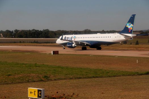 campinas, sao paulo / brazil - july 30, 2013: Azul Linhas Aereas Embraer 195 aircraft is seen at Campinas International Airport.

