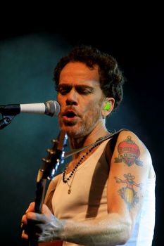 cairu, bahia / brazil - november 14, 2013: Singer Nando Reis is seen during concert at the Spring Festival in Morro de Sao Paulo.


