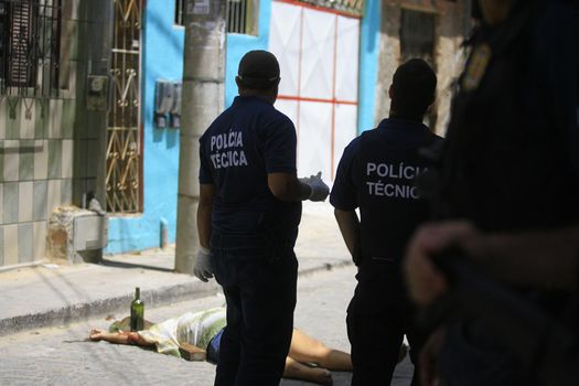 salvador, bahia, brazil - january 1, 2014: Police investigate a homicide site in the city of Salvador.