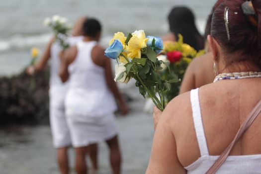 salvador, bahia, brazil - february 2, 2015: Candomble devotees and supporters of the African matriaz religion pay tribute to the orixa Yemanja in the city of Salvador.