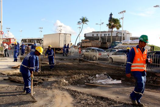 salvador, bahia / barazil - march 6, 2014: Workers are seen in revitalization works in the Barra neighborhood in the city of Salvador.



