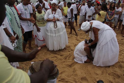 salvador, bahia, brazil - february 2, 2015: Candomble devotees and supporters of the African matriaz religion pay tribute to the orixa Yemanja in the city of Salvador.