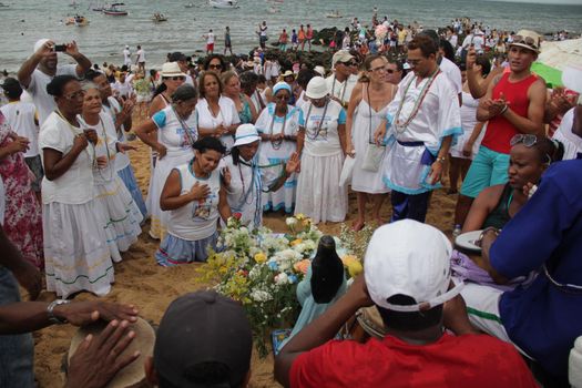 salvador, bahia, brazil - february 2, 2015: Candomble devotees and supporters of the African matriaz religion pay tribute to the orixa Yemanja in the city of Salvador.