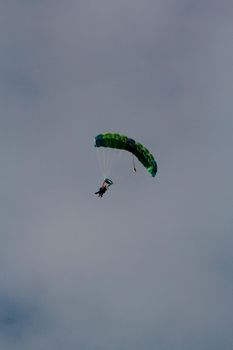 salvador, bahia, brazil - august 18, 2012: parachute jump in the Ilha de Itaparica region in Bahia.