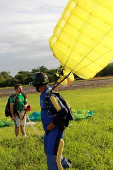 salvador, bahia, brazil - august 18, 2012: parachute jump in the Ilha de Itaparica region in Bahia.